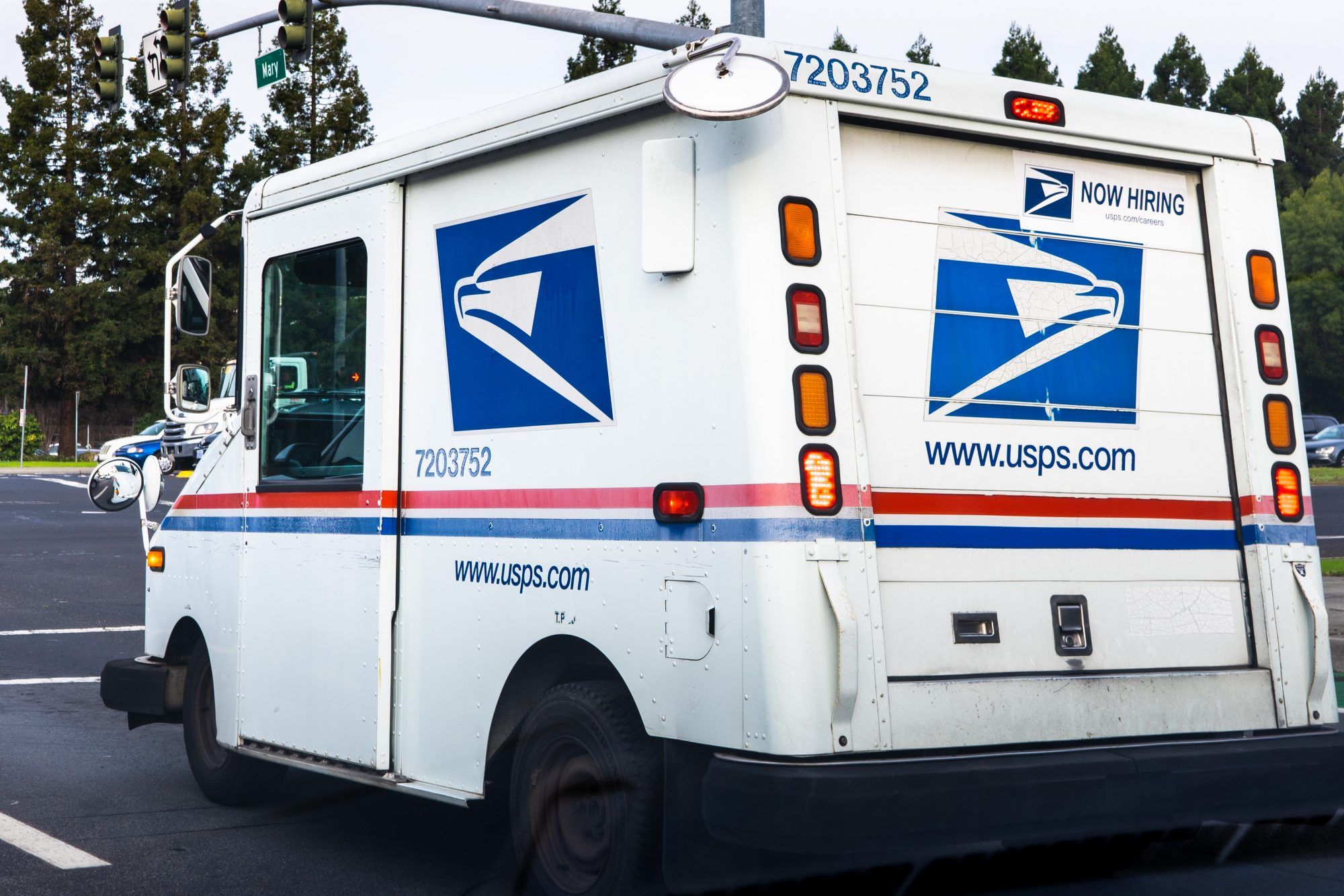 Trash Bags of Undelivered Mail Found Outside a Postal Worker's Home